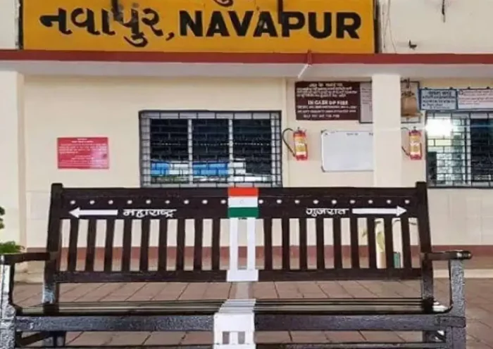 Navapur railway station built in two states, one state has ticket window, the other has waiting room